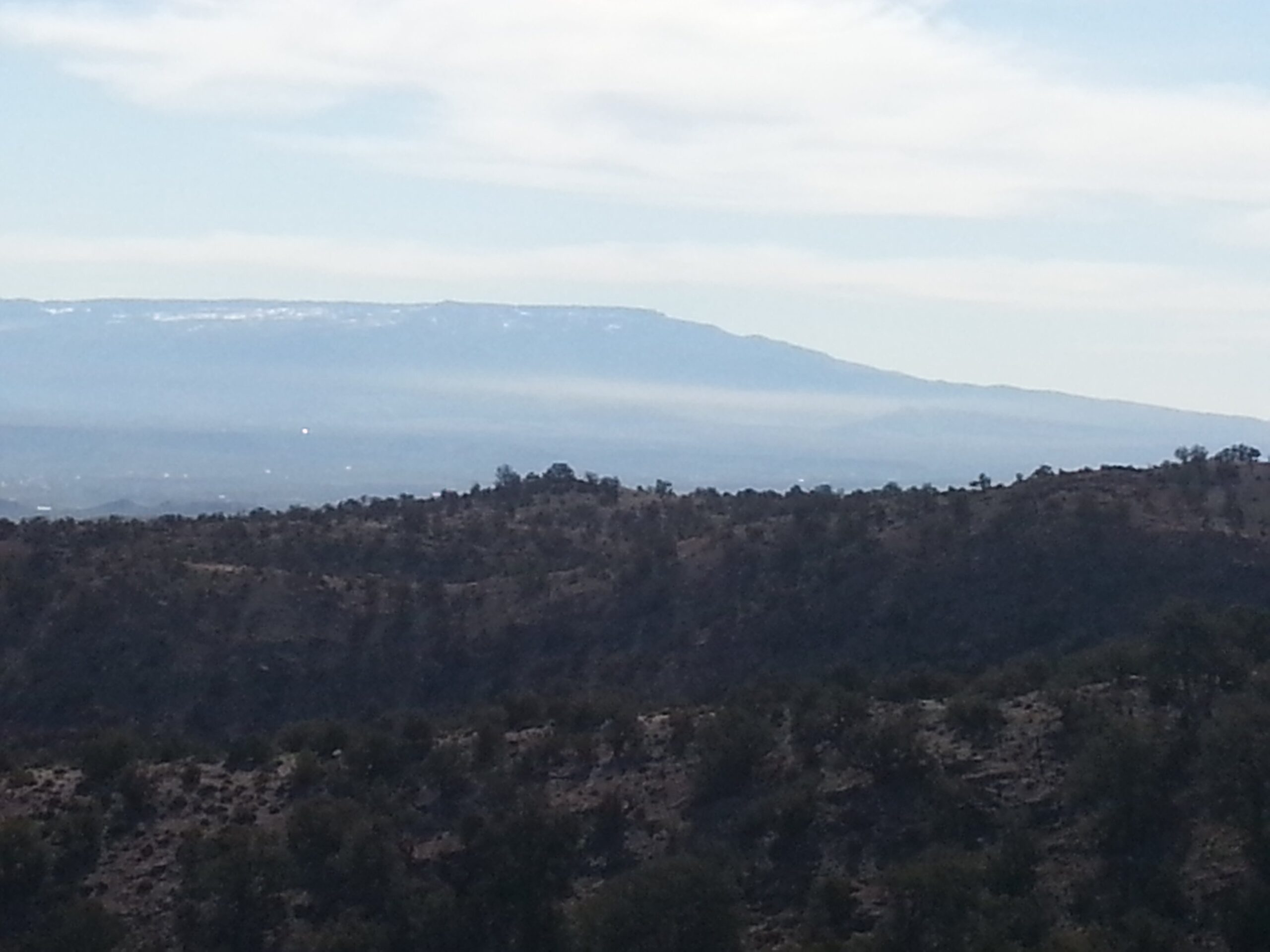 A pall of smoke from open burning hangs in the air over the Grand Valley during last year's fall open burning season
