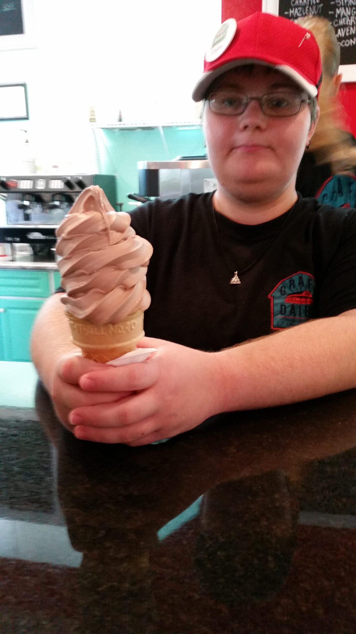 Generous servings -- ice cream is piled about as high as it can go without falling over