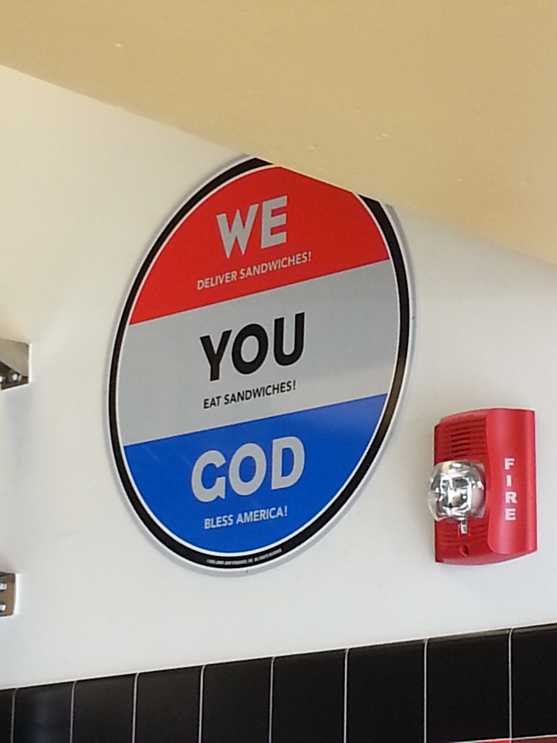 Religious sign posted in Jimmy John's -- an ominous sign that there is more wrong with the chain than meets the eye.