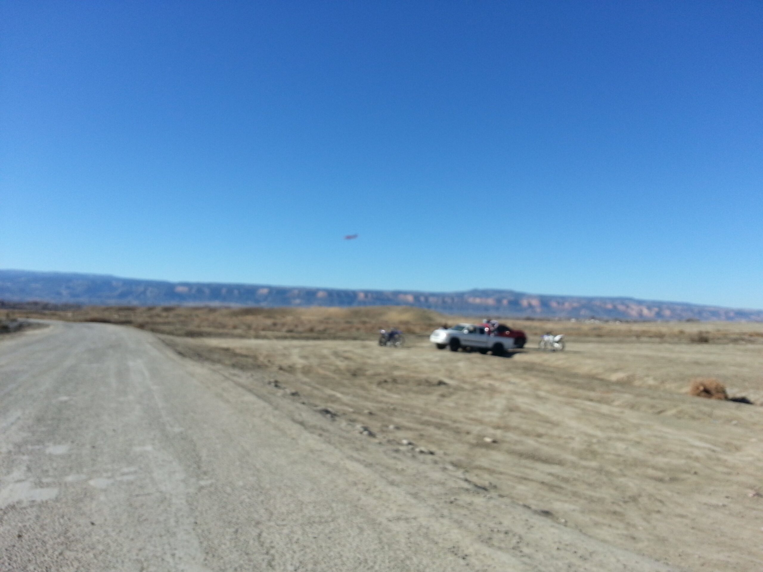 An airplane flies over areas on BLM land where shooting is permitted, right underneath the takeoff/landing patterns for G.J. Regional Airport