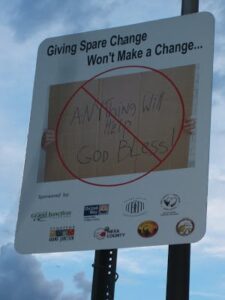 Weak, barely-legible and ineffective signage attempt to address homelessness and poverty in Grand Junction