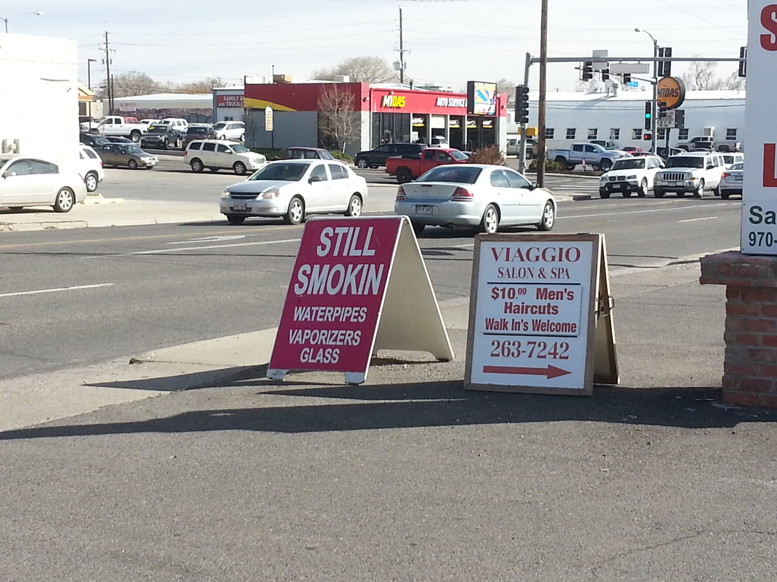 Still Smokin' advertises pot paraphernalia by the busy intersection of First Street and North Ave.